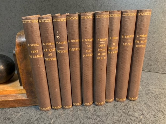 Set of 9 bound books by famous French authors all in attractive half linen bindings.